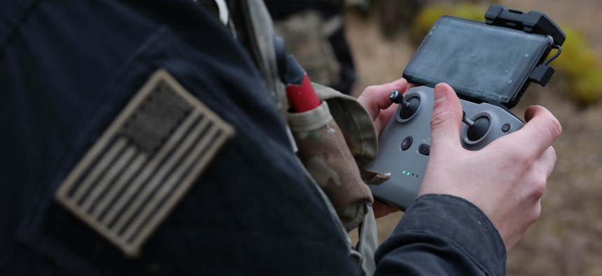 Soldier using drone remote